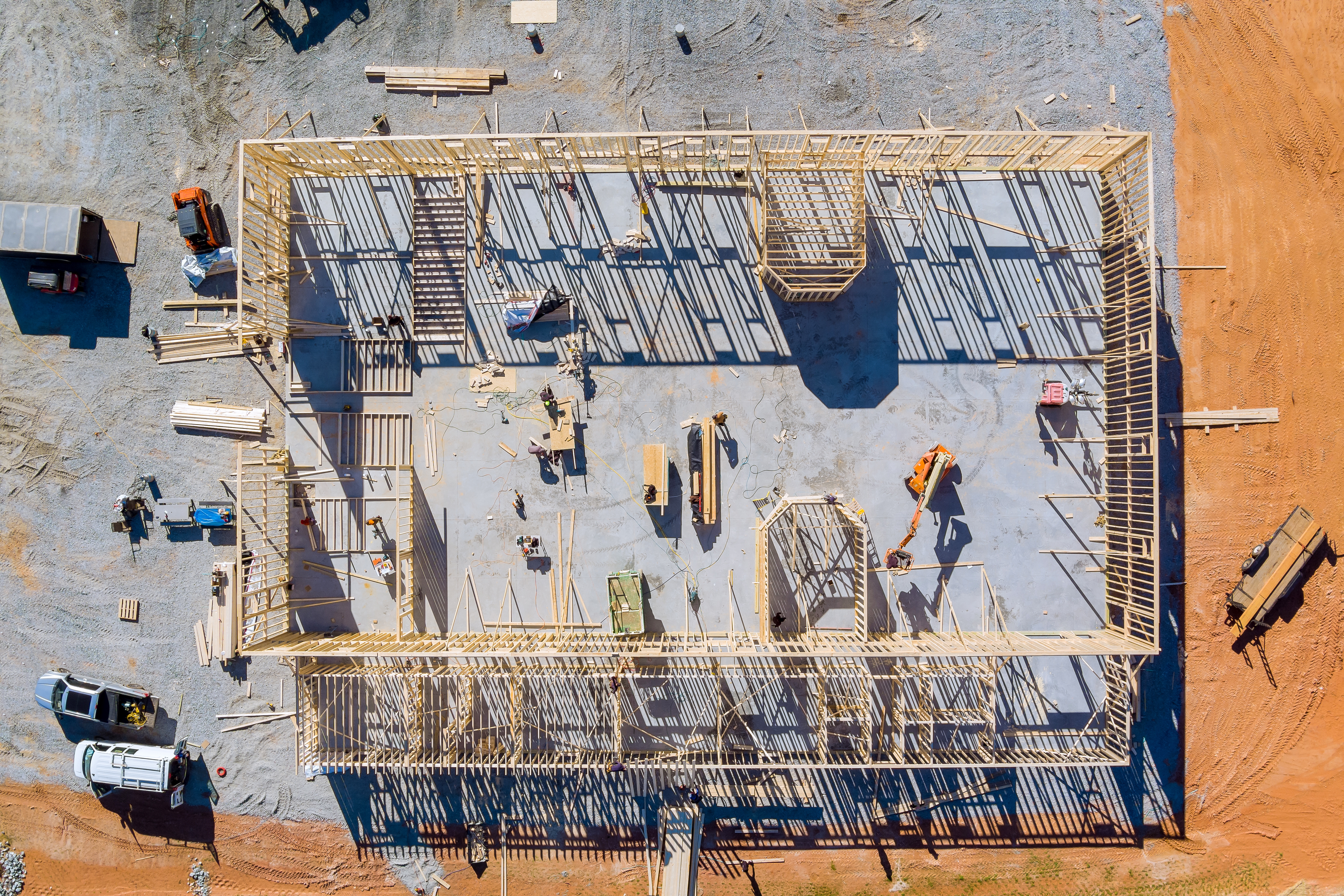 Aerial view framing of beams on new home under construction
